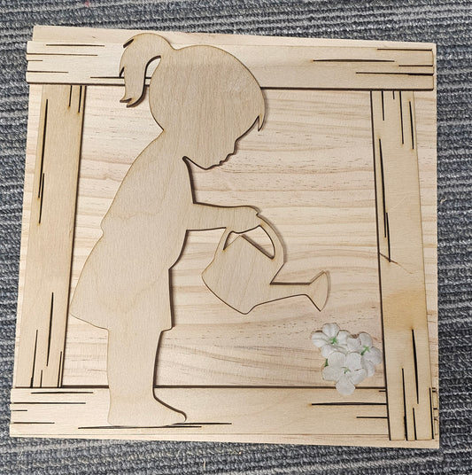 Girl watering flowers